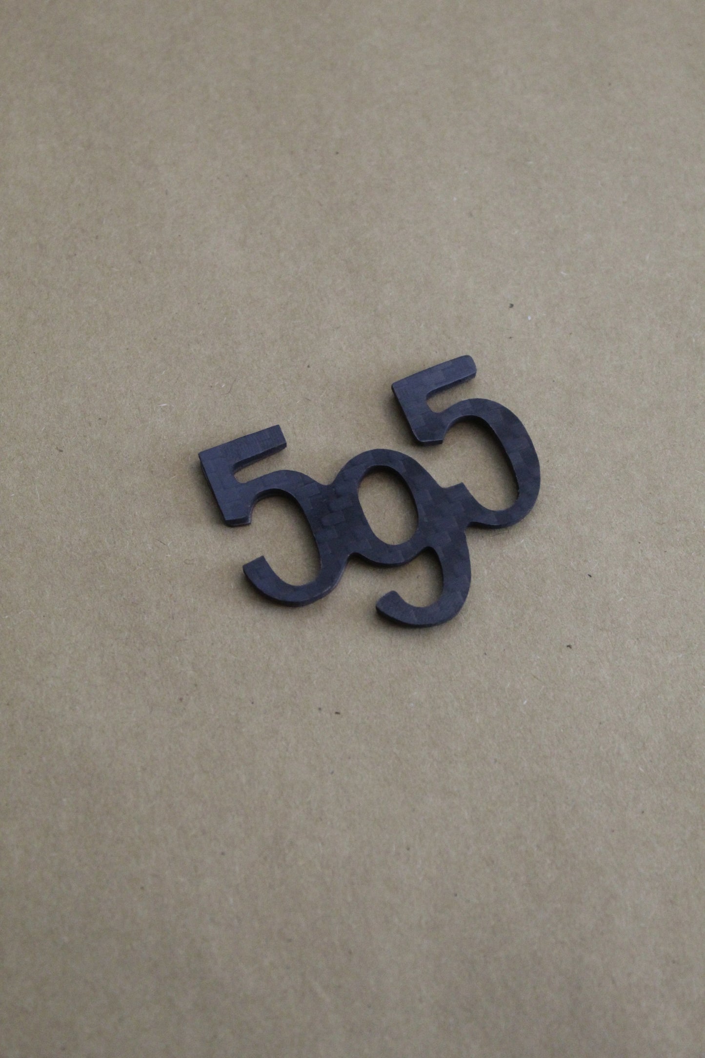595 Badge - Real Carbon