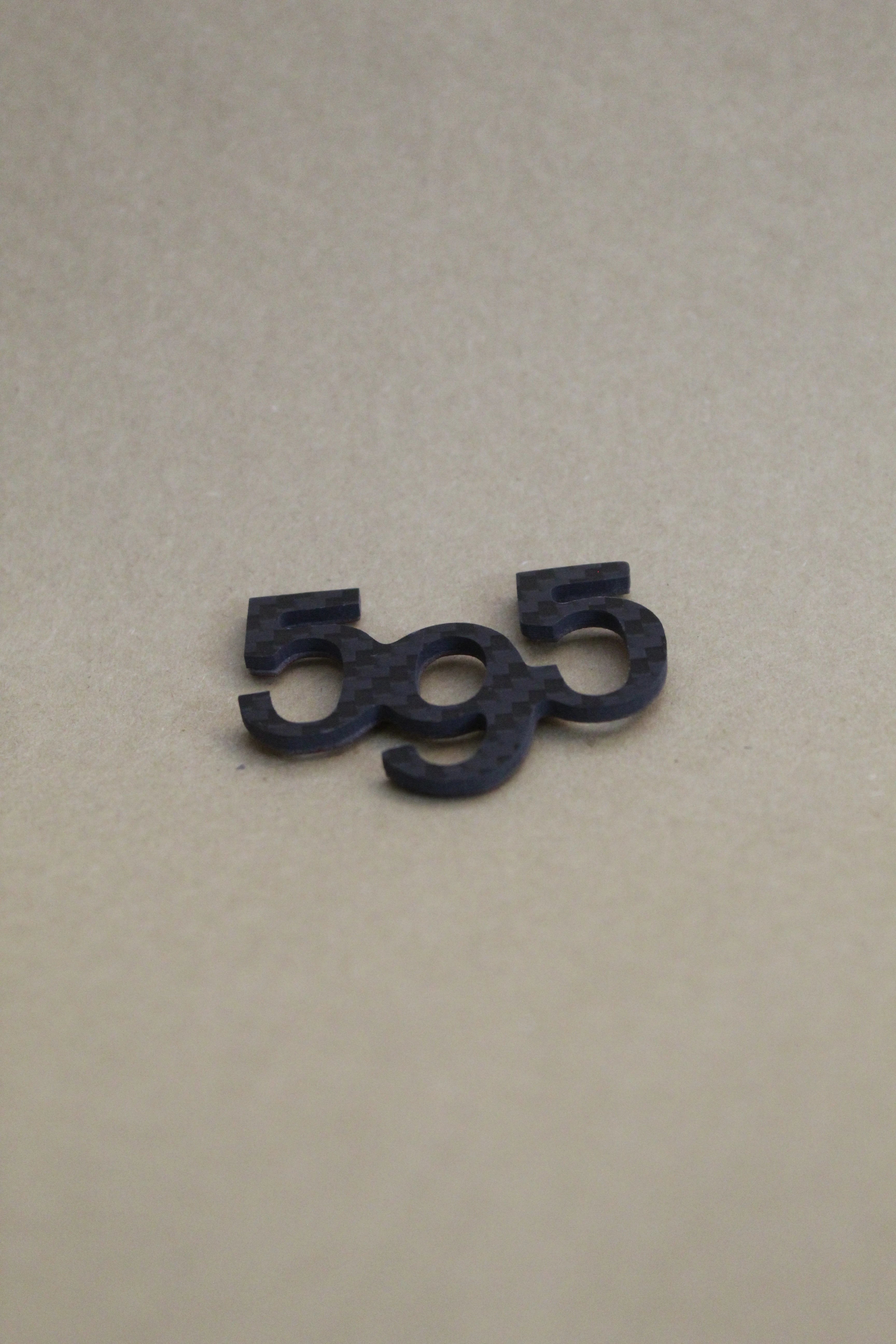 595 Badge - Real Carbon